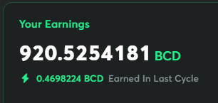 A dark earnings dashboard showing 'Your Earnings: 920.5254181 BCD' with '0.4698224 BCD Earned In Last Cycle' displayed below.