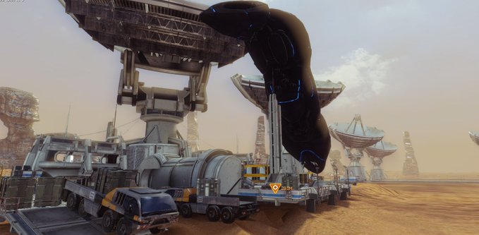 A sci-fi scene featuring heavy industrial machinery and trucks operating in a desert landscape, with a large black spacecraft hovering above and satellite dish structures visible in the distance.