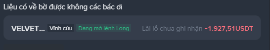 A dark-themed chat or interface in Vietnamese showing a user "VELVET..." with the status "Đang mở lệnh Long" (Opening a long order) and an unrealized loss of "-1,927,51USDT."