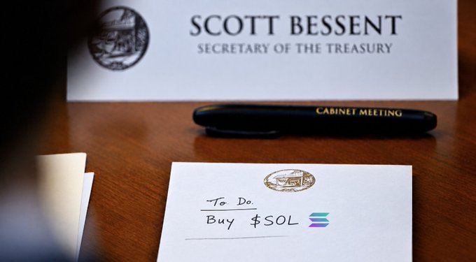 An over-the-shoulder shot of a desk setup featuring a nameplate for 'SCOTT BESSENT, SECRETARY OF THE TREASURY' and a 'CABINET MEETING' pen, with a handwritten 'To Do' note in the foreground listing 'Buy $SOL' next to the Solana logo.