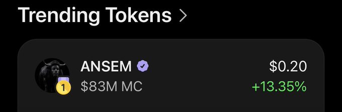 A screenshot of a 'Trending Tokens' section showing ANSEM at $0.20 with a $83M market cap and a +13.35% increase.