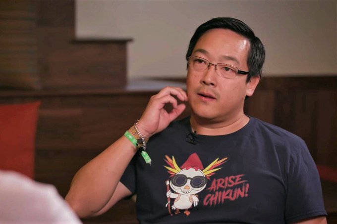 ?"The creator of Litecoin. Cryptocurrency enthusiast. Ex-director of engineering at Coinbase. Director of the Litecoin foundation. Lover of Chikun". The man wearing a dark blue shirt with a cartoon character says, "Chikun", indicating his interest in cryptocurrency and possibly a connection to the artist or creator of the character. This image is part of a conversation about Litecoin, as suggested by the caption provided.