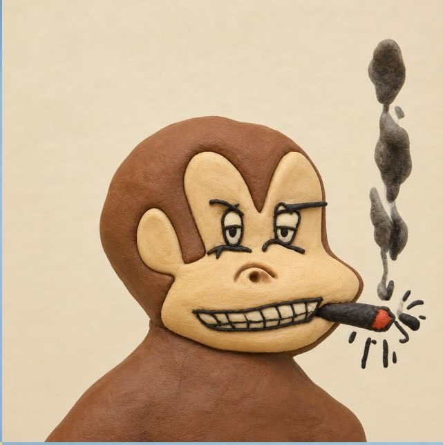 A claymation-style figurine of a brown monkey with an angry expression, smoking a cigarette with dark smoke rising beside it.