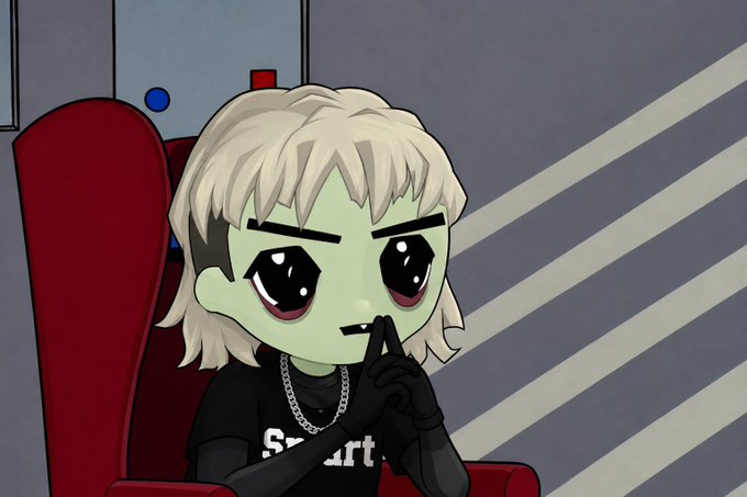 An animated chibi-style character with light green skin, blonde hair, and large expressive eyes sits in a red chair wearing a black shirt.