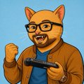 A cartoon illustration shows a smiling man with glasses and cat ears giving a thumbs-up while holding a blue video game controller against a blue background.