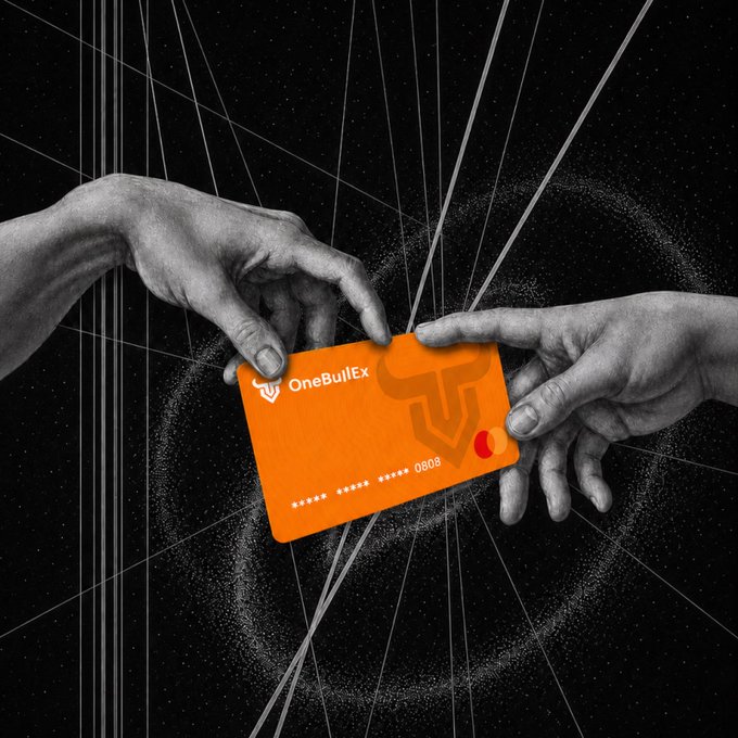 Two hands exchanging an orange OneBullEx debit card against a black background with white geometric lines and a swirling particle effect.