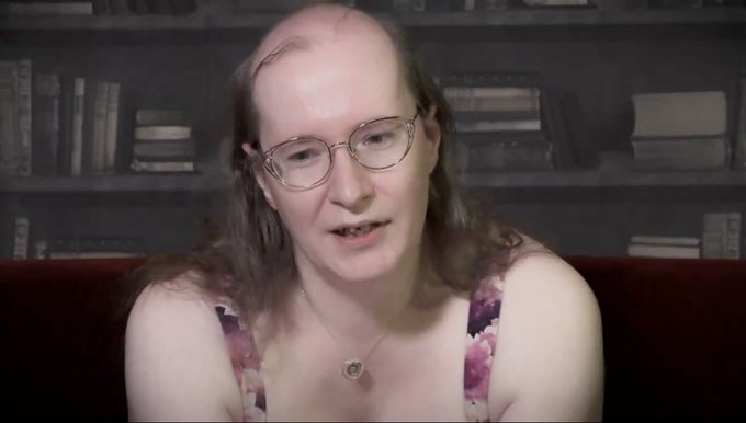 A man with long hair and glasses sits in front of a bookshelf, appearing to be in the middle of speaking, likely commenting on the dramatic rise in Zcash (ZEC) from $50 to $1500.