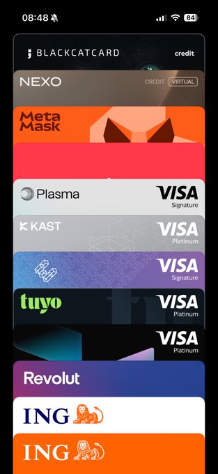 A mobile phone screenshot displaying a digital wallet app titled 'BLACKATCARD' with the 'credit' tab selected, showing a vertical list of virtual cards from issuers including NEXO, MetaMask, Plasma, KAST, tuyo, Revolut, and ING.