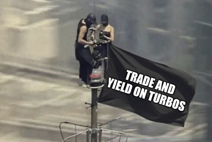 Two motorcyclists in black balaclavas ride atop a pole waving a black flag emblazoned with "TRADE AND YIELD ON TURBOS," symbolizing a bold, rebellious rallying cry for Sui's trading community. The masked riders and flag evoke a fearless, mischievous energy fitting the "In Sui we trust" mantra, framing Turbo trading as a daring act of faith in the ecosystem.