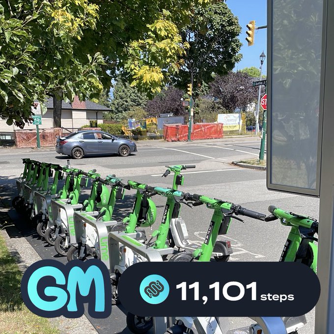 A row of bright green Lime e-scooters is lined up on a street corner near a bus stop, with an overlay showing "GM" and "11,101 steps".