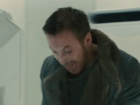 A man with short brown hair and a beard, wearing a shearling jacket, looks down with a pained, grimacing expression as if reacting to bad news. The image pairs with the post to visually convey distress over the contrast between GitHub outages and Bitcoin's persistent uptime.