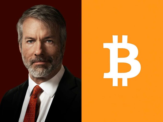 A man in a suit with a red tie is shown alongside the Bitcoin logo, relating to the news of Strategy (formerly MicroStrategy) expanding its USD reserves to $5.10 billion through the sale of MSTR shares.