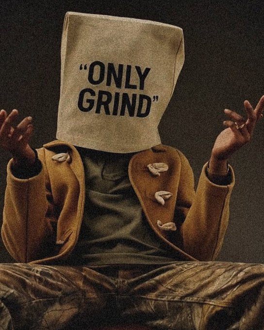 A figure with a paper bag over their head labeled "ONLY GRIND" sits with hands raised, fitting the "GM Legends" post about daily hustle and crypto minting.