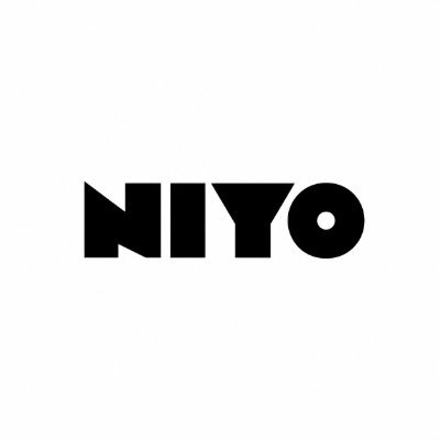 The image features a logo for an online community called "Alpha Owls" that focuses on the word "NIO". The logo consists of the word "NIO" written in black text against a white background, with the letters arranged in a way that makes them stand out prominently. The post also includes some additional information about the giveaway and how to participate.