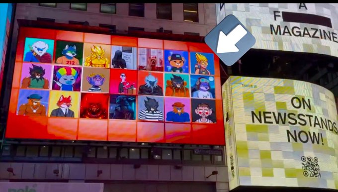 The image features a large billboard with a red background, displaying an array of colorful cartoon characters against a white wall. The billboard also includes a small square that reads "On Newsstands Now!" at the bottom right corner. In addition to the main billboard, there is another smaller billboard in the top left corner and a third one in the bottom right corner.