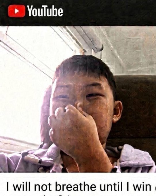 A YouTube thumbnail showing a young boy with his hand covering his mouth, with the caption "I will not breathe until I win" partially visible at the bottom.