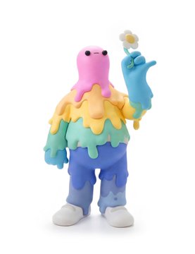 A colorful, cartoonish figurine of a Doodles character—a pink-headed, multicolored figure with a rainbow-striped body holding a daisy—showcasing the toy-style aesthetic central to the Doodles Toy Factory announcement.