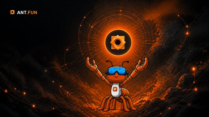 An orange ant character with glowing VR goggles and raised arms stands before a radiant, gear-themed sun on a cosmic backdrop, with "ANT.FUN" displayed in the top-left corner—capturing the post's energetic "make your move" vibe through a futuristic, ready-for-action aesthetic.