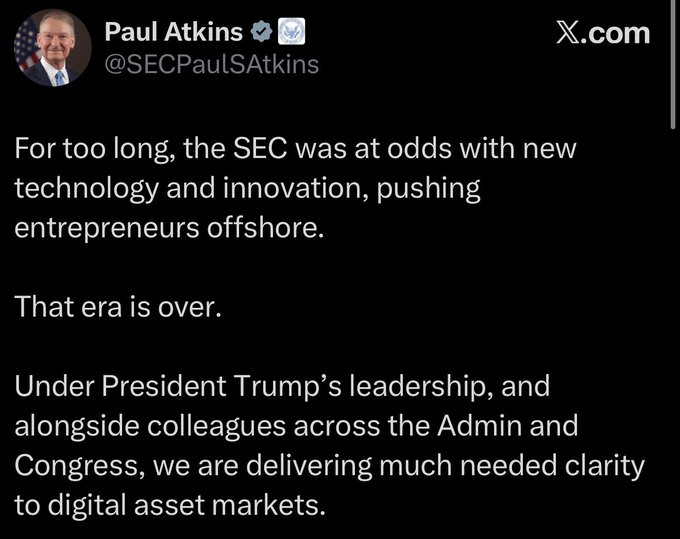 The image features a black background with white text that reads "Under President Trump's leadership, alone side colleagues across the Admin and Clarity @RippleXrpie". The text also mentions that the SEC Chair Paul Atkins has been talking about delivering real clarity to digital assets.