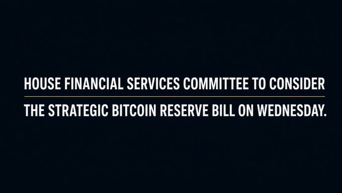 A dark navy graphic displays white capitalized text reading "HOUSE FINANCIAL SERVICES COMMITTEE TO CONSIDER THE STRATEGIC BITCOIN RESERVE BILL ON WEDNESDAY," directly supporting the breaking news announcement that the committee will review H.R. 8957, the American Reserve Modernization Act of 2026, introduced by Rep. Nick Begich.