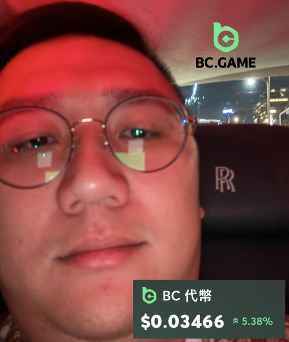 A young man with glasses takes a selfie with a reddish hue, overlaid with a "BC.GAME" logo showing "BC 代幣" priced at $0.03466 with a 5.38% gain displayed at the bottom. The image illustrates the post's humor about the diminishing emotional impact of massive gains on the $BC token, capturing the deadpan, unimpressed expression of someone whose earnings have grown so large they've become numbing rather than thrilling.