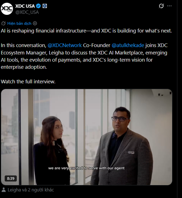 An X (Twitter) post from XDC USA (@XDC_USA) about AI reshaping financial infrastructure, featuring a video thumbnail of Co-Founder @atulkhekade and Leighha discussing the XDC AI Marketplace.