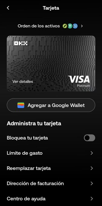 A mobile app screen titled 'Tarjeta' showing a black OKX Visa Platinum card with options to manage the card including 'Bloquea tu tarjeta' (Block card), 'Límite de gasto' (Spending limit), 'Reemplazar tarjeta' (Replace card), and add to Google Wallet.
