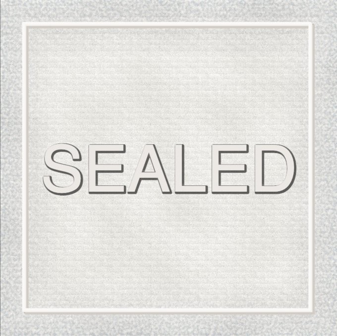 A silver, textured image with the word 'SEALED' embossed in the center.
