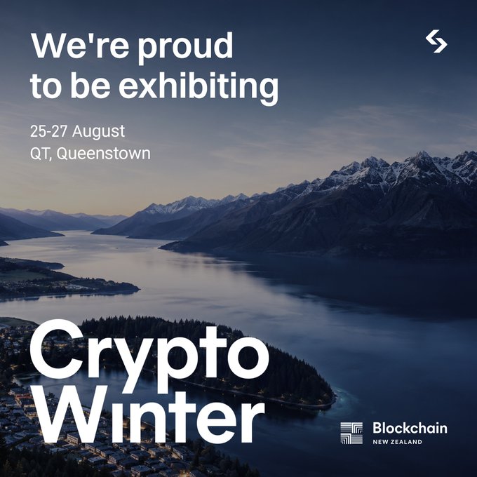 A scenic aerial view of Queenstown, New Zealand at dusk, showcasing the town nestled along Lake Wakatipu with snow-capped mountains in the background. Overlaid text reads "We're proud to be exhibiting," "25-27 August, QT, Queenstown," "Crypto Winter," and features the "Blockchain New Zealand" logo, promoting Bitget's participation in the CryptoWinter26 event.