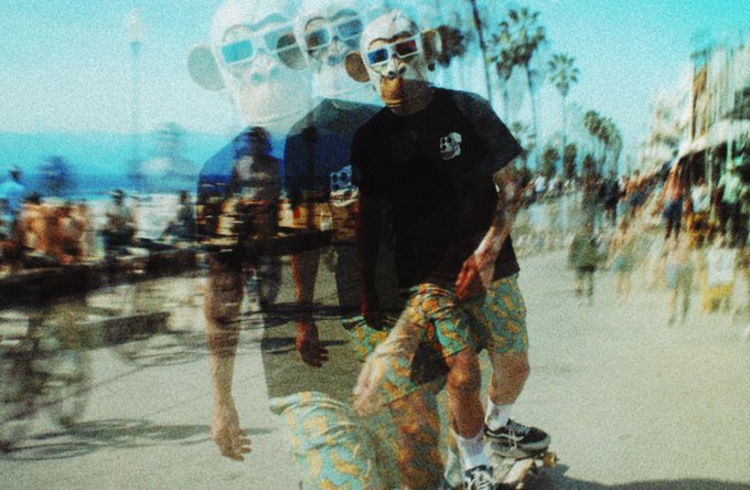 The image features a man wearing sunglasses, a black shirt, and green shorts riding a skateboard down a street. He appears to be enjoying his ride as he passes by people walking along the sidewalk. The photo has been edited with a filter that makes him look like an animal or a character from a movie, adding a unique and creative touch to the image.

The post includes text that reads "GM bored ape yacht club". This could potentially be a reference to a popular meme or a social media trend involving skateboarding and wearing sunglasses. The edited photo of the man on his skateboard adds an element of humor and creativity, making it more engaging for viewers who appreciate such visual content.