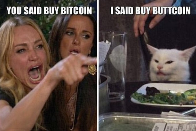 A humorous meme with two panels: the left shows the 'Woman Yelling at Cat' meme captioned 'YOU SAID BUY BITCOIN', and the right shows the cat captioned 'I SAID BUY BUTTCOIN'.