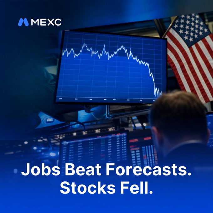 A trader watches a monitor displaying a sharply declining stock chart in front of an American flag, with the MEXC logo and text reading "Jobs Beat Forecasts. Stocks Fell." highlighting the market downturn being analyzed.