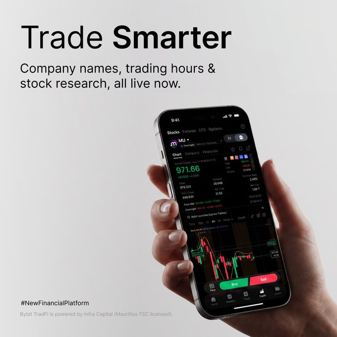 The image is a promotional graphic for Bybit's TradFi platform, featuring a hand holding a smartphone displaying a stock trading interface for Micron Technology (MU) with a price of 971.66, alongside the tagline "Trade Smarter" highlighting new features like full company names, trading hours, and stock research tools.