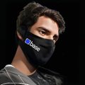 A small photo of a young man wearing a black face mask with a Facebook logo, resembling Mark Zuckerberg.