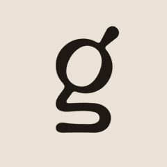 A black and white logo featuring a stylized lowercase 'g' with a swooping tail design.
