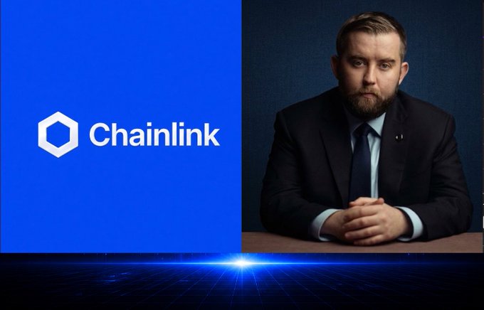 A promotional image featuring the Chainlink logo on a blue background alongside a portrait of a bearded man in a dark suit.