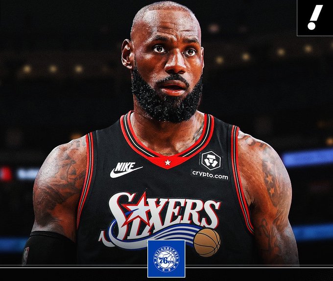 A digitally altered image shows LeBron James wearing a black Philadelphia 76ers jersey featuring the "crypto.com" sponsor patch, with the post's accompanying "76ers" logo and exclamation graphic at the top right—illustrating the satirical meme about crypto sponsorships in sports.
