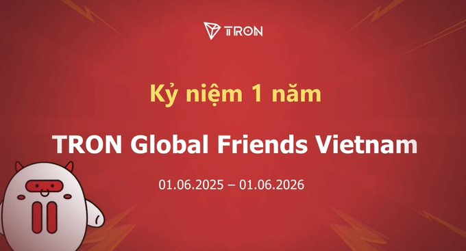 The image features a poster for TRON Global Friends Vietnam with a cartoon character standing next to a red background that says "Tron Global Friends Vietnam" written in Vietnamese. The poster also includes text in both English and Vietnamese, which reads "Tron Global Friends Vietnam", "01/06/2025 - 01/06/2026", and "Tron Global Friends Vietnam".