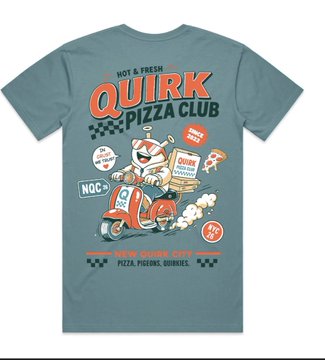 A light blue t-shirt featuring a cartoon panda mascot on a scooter with "QUIRK PIZZA CLUB" branding and the tagline "NEW YORK CITY PIZZA PEOPLE QUIRKS."