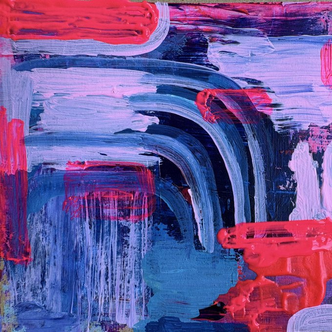 An abstract painting features bold brushstrokes in shades of red, blue, and purple, creating a dynamic and textured composition.