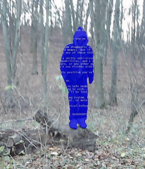 A blue silhouetted figure of a person stands in a bare winter forest, with their body filled with visible computer text suggesting a corrupted error or blue screen of death message.