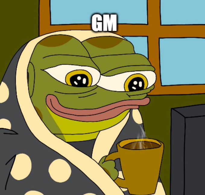 The image features a cartoon frog wrapped up in a blanket, holding a cup of coffee while sitting by a window. The caption reads "GM CT A lot of crypto products still make users think too much before doing the simplest things? That's what I like about @useTria". This suggests that the post is related to cryptocurrency or digital currency and might be discussing the complexities involved in understanding and using such systems, as well as the potential challenges faced by users.