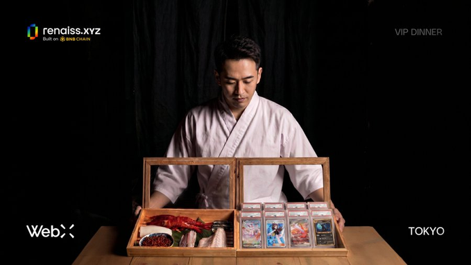 A chef in a white kimono presents an open wooden box containing seafood and graded trading cards, with overlays reading "renaiss.xyz BUILT ON BNB CHAIN," "VIP DINNER," "Web3," and "TOKYO." The image visually frames the Renaiss.xyz concept by pairing high-value physical collectibles (the chef's curated spread) with tokenized cards, symbolizing the bridge between tangible assets and their Web3 representations.