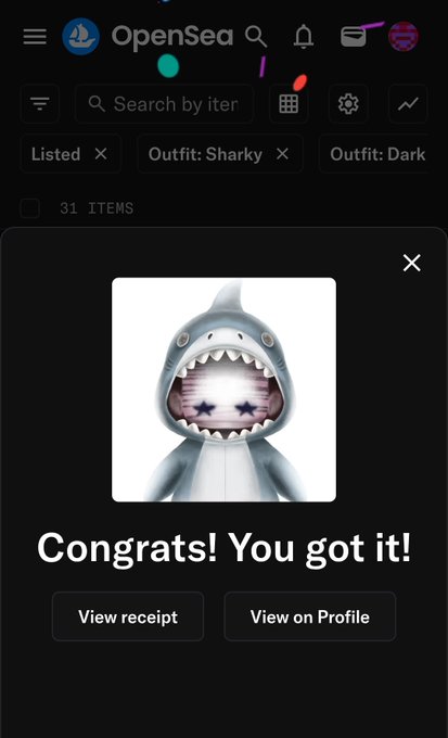 An OpenSea app screenshot showing a 'Congrats! You got it!' message with a cartoon shark NFT displayed in the center.