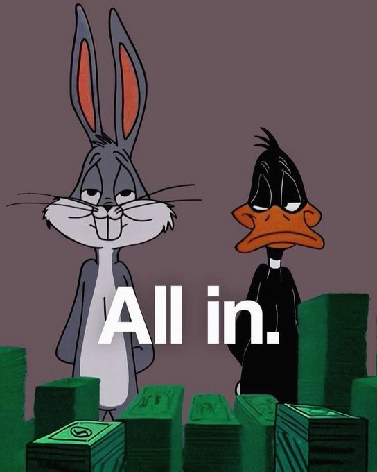 A Bugs Bunny and Daffy Duck cartoon image shows the two characters standing with stacks of cash, overlaid with the bold text "All in."