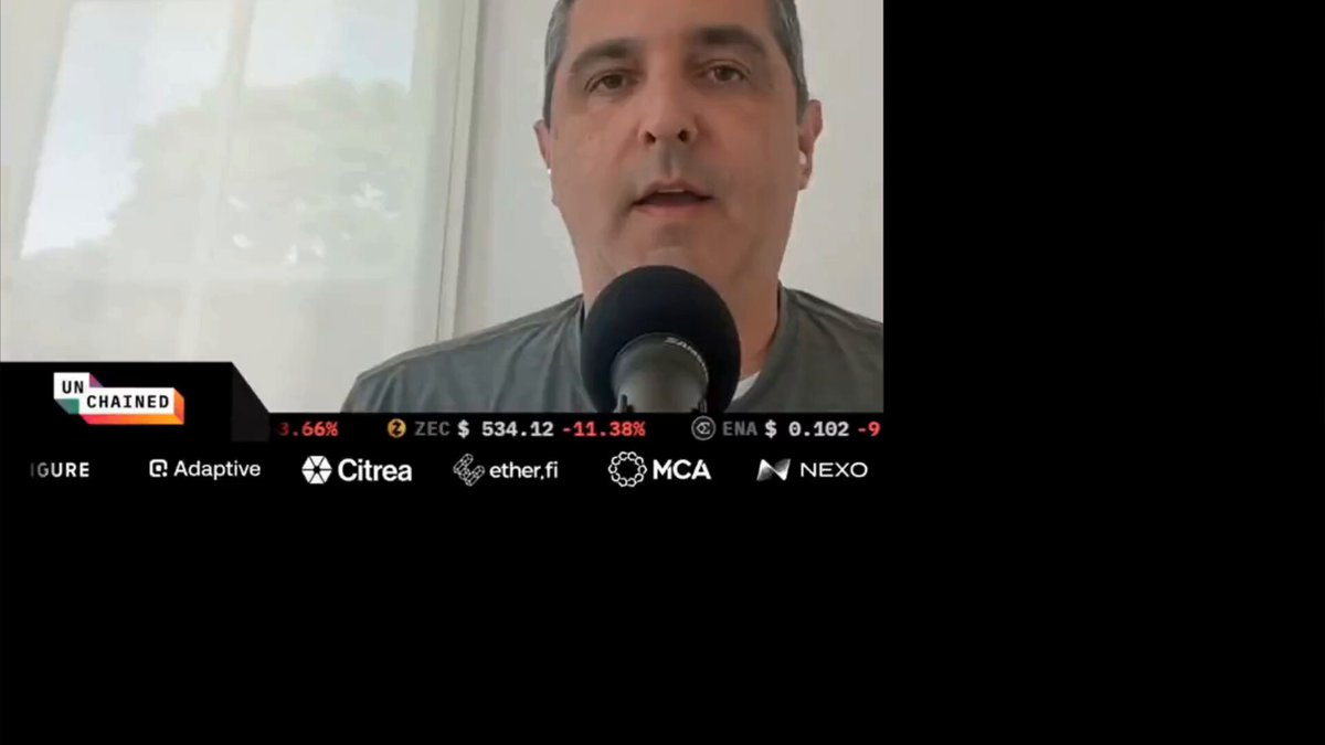 The image shows a man speaking into a microphone, possibly at an event or conference. The background of the image features a window with blinds, suggesting that they are indoors. The caption below the image provides information about Solana, which is a cryptocurrency platform. It mentions that the platform has been underperforming and that activity fees peaked early in 2020, indicating a downward trend since then. The post also discusses how the platform could improve its performance and what key stakeholders can do to help it succeed.