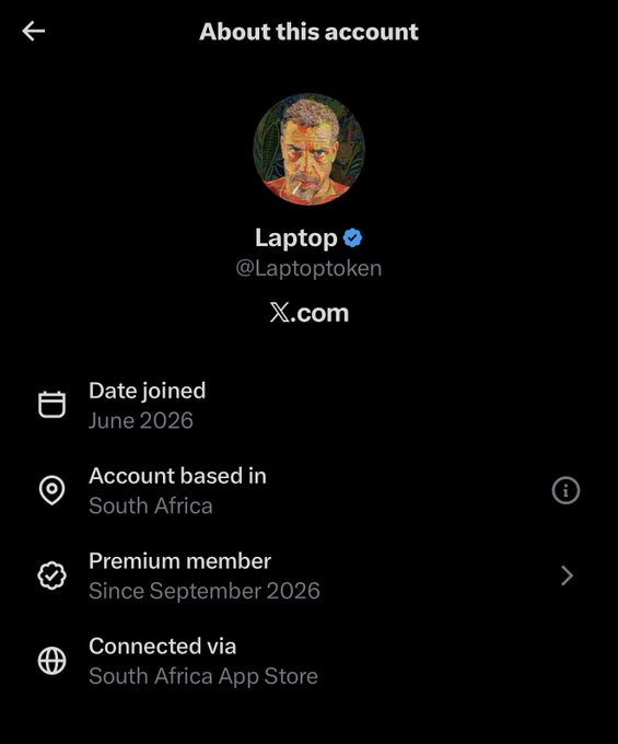 The image shows the "About this account" page for a verified account named "Laptop" (@Laptoptoken) on X, listing it as based in South Africa and joined in June 2026. The post mocks this South African location for what appears to be a cryptocurrency token's "official" account, questioning the industry's seriousness with a crying emoji.