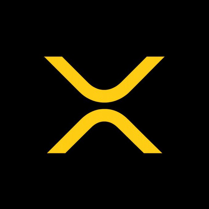 The image displays the yellow XRP logo on a black background, representing the XRP cryptocurrency whose ledger has received major investments from Ripple to expand its tokenized asset infrastructure.