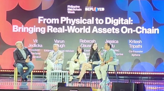 The image shows a panel discussion at the Philippine Blockchain Week titled "From Physical to Digital: Bringing Real-World Assets On-Chain," featuring speakers Vit Jedlicka (President of Liberland, Operator), Varun Singh (Financial Advisor), Rebecah Dause (Court), Jessica Yu (Enterprise), and Kritesh Tripathi (Co-Founder of Xphere). The scene ties directly to the post about Xeffy_io's practical approach to RWA adoption, illustrating the broader industry conversation around tokenizing real-world assets that Xeffy_io is contributing to.