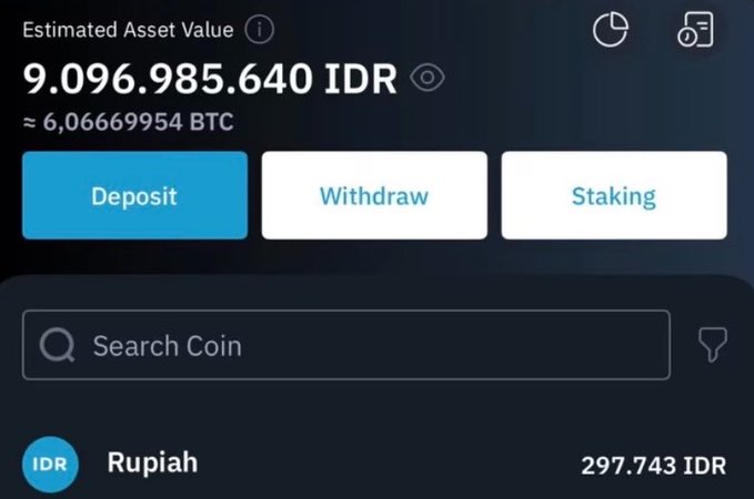 A cryptocurrency portfolio dashboard showing an estimated asset value of 9,096,985,640 IDR (≈6.0669954 BTC), with options to Deposit, Withdraw, or Stake. The image illustrates the post's point about letting money "work" by stacking crypto as part of an investment strategy to support a comfortable life in Indonesia.